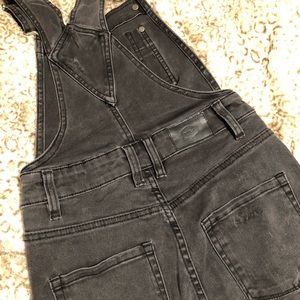 Black distressed overalls
